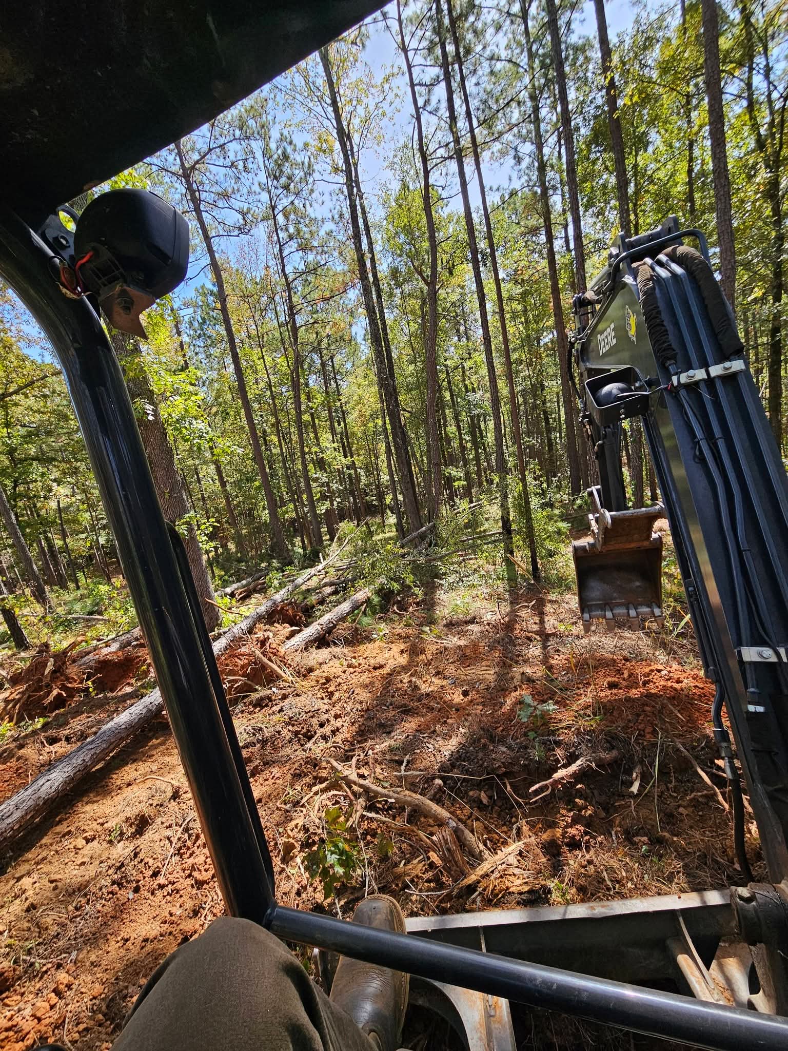 Land clearing in progress — view from the cab