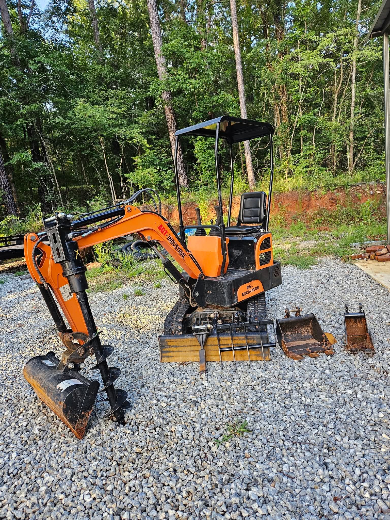 Mini Excavator with auger attachment